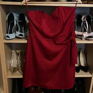 Red sweetheart strapless dress with bow onthe side.Tag still attached,never worn